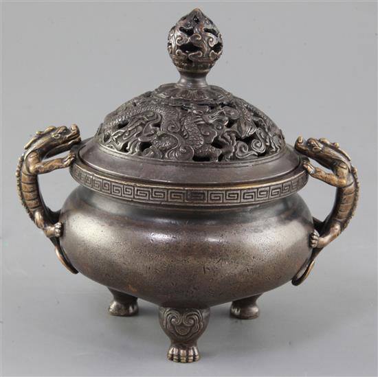 A Chinese bronze ding censer and cover, width 16cm